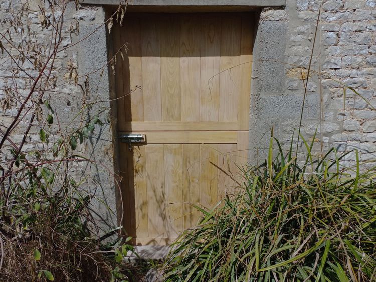 Porte à deux battants