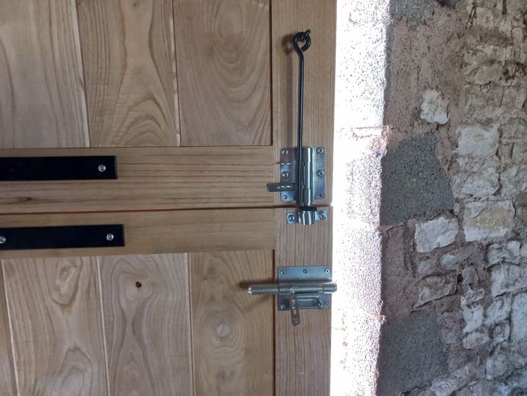Porte à deux battants