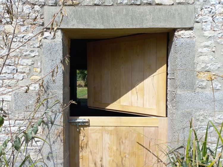 Porte à deux battants